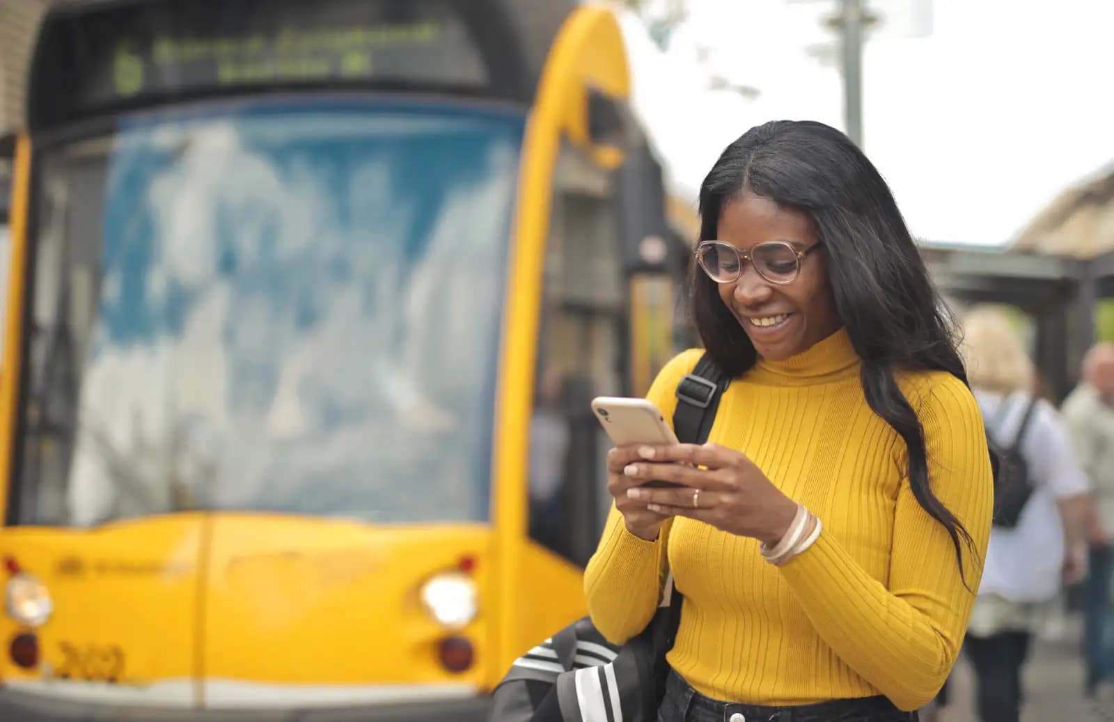 User checking the app in front of a coach